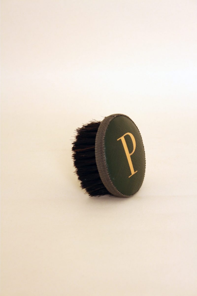 Brush with embossed letter P